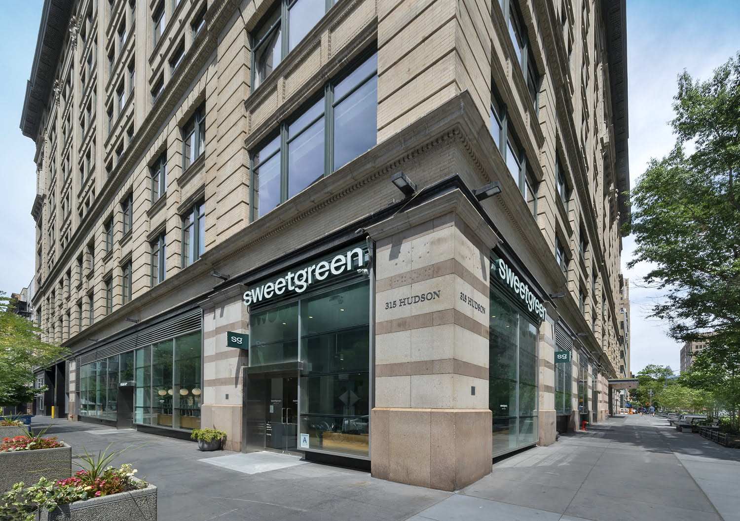 A view of Sweetgreen and the exterior at 315 Hudson Street