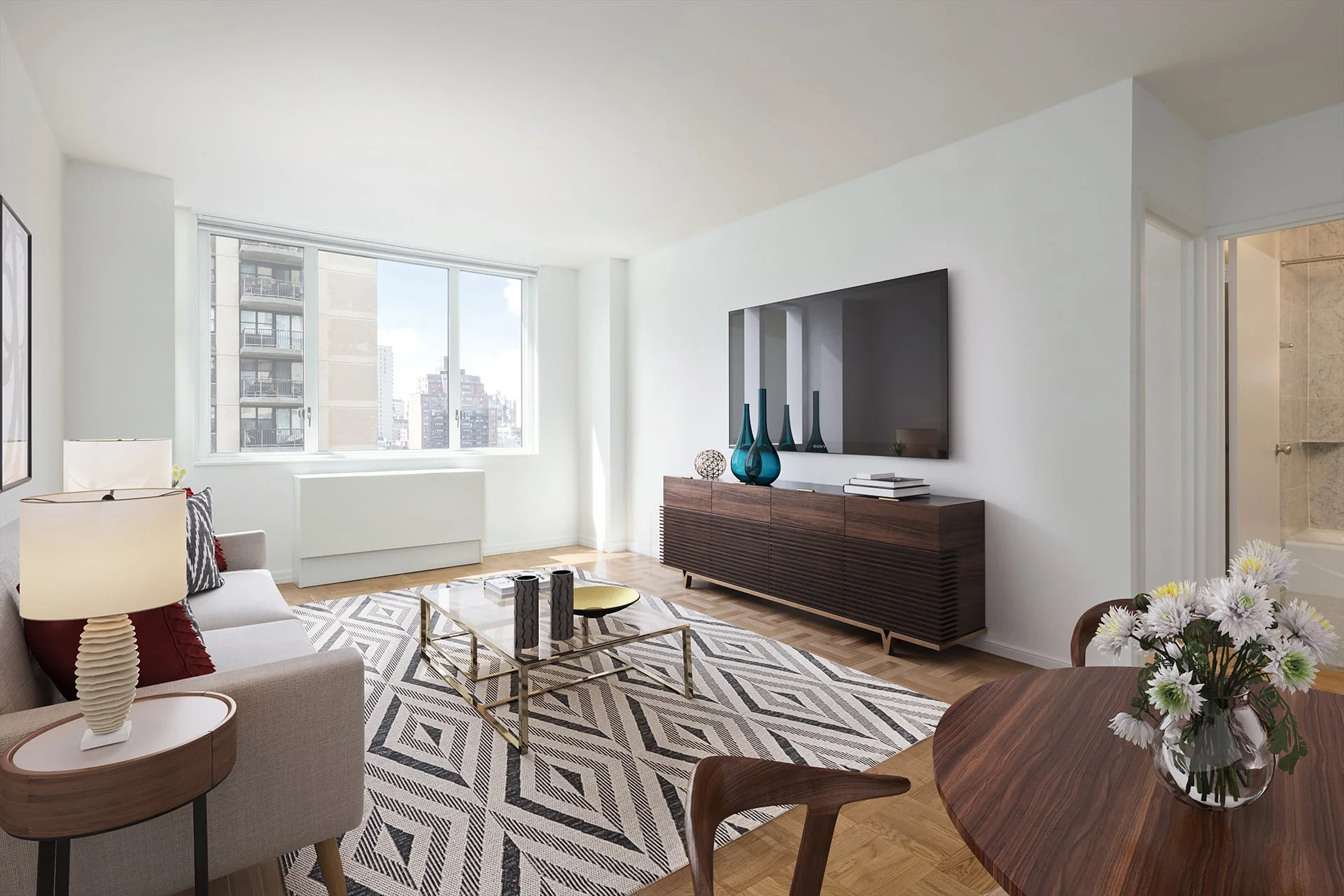 View of Gracie Mews staged living room located in the D line at 401 East 80th Street