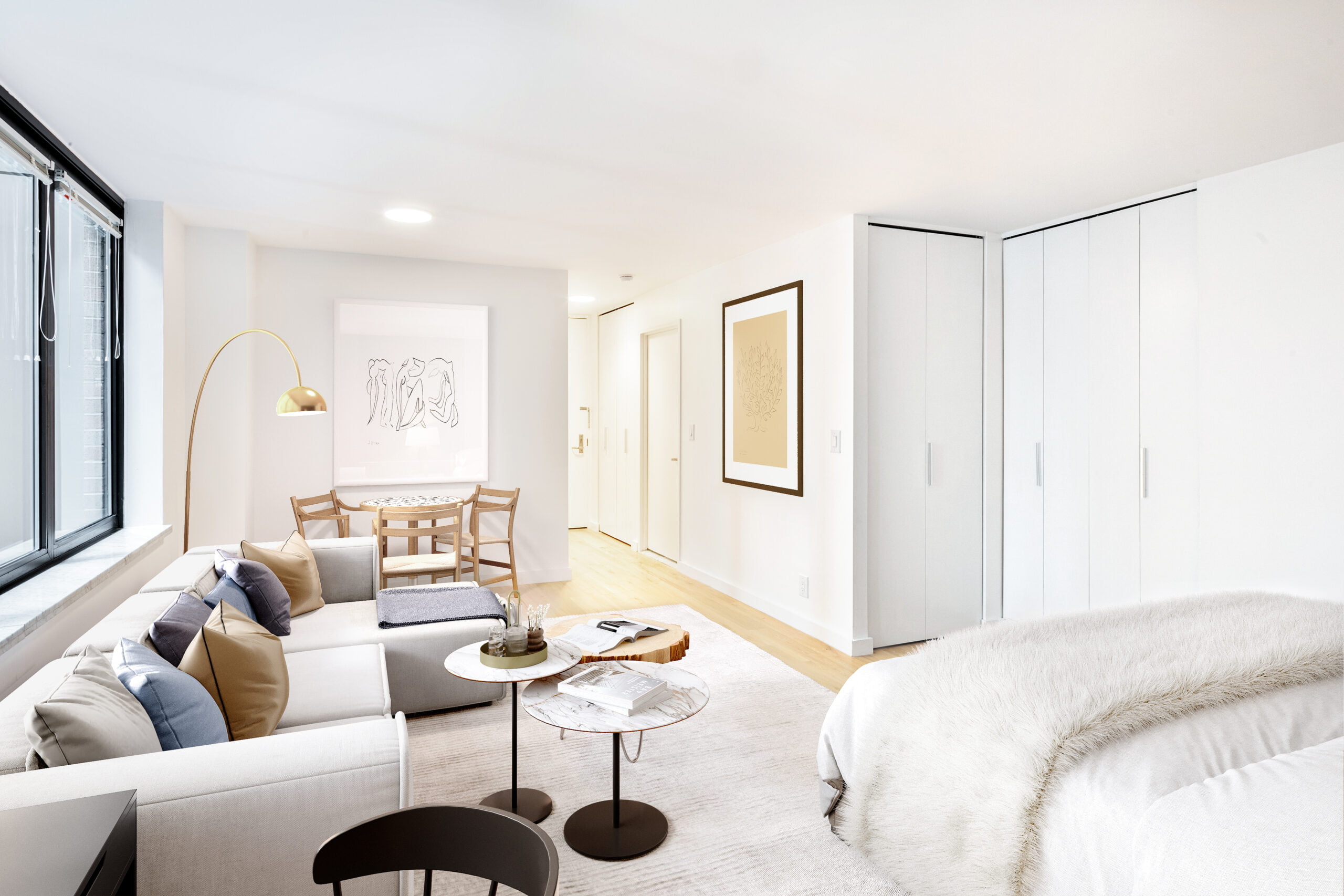 View of Symphony House 235 West 56th Studio Apartment Bedroom and Couch (A Line)