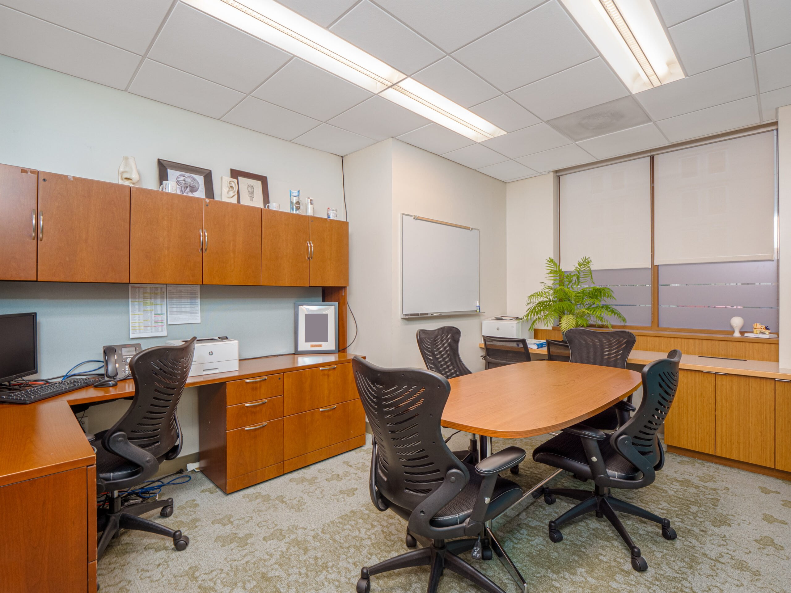 A view of an office and conference table at 428 East 72nd Street